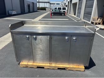 Stainless steel storage with stainless top