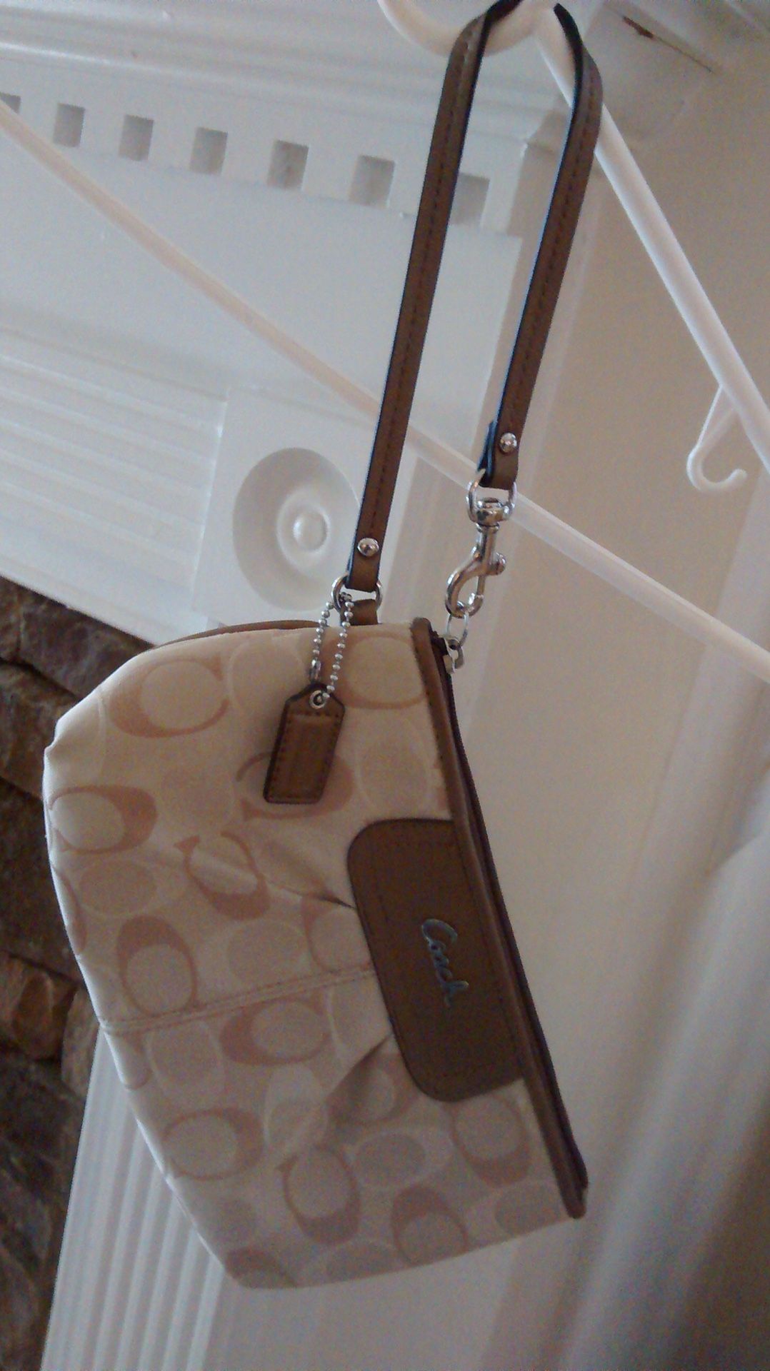 Coach- Ashley Signature Light Khaki Large Zip Wristlet.