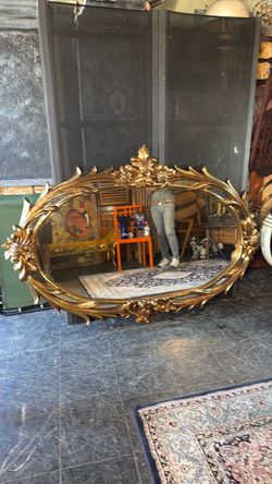 Beautiful, gold leaf oval large mirror