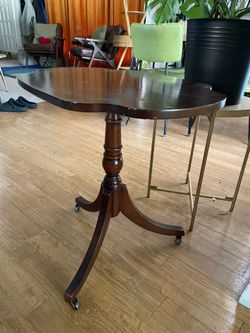 Vintage MCM “Lane” pedestal table on casters
