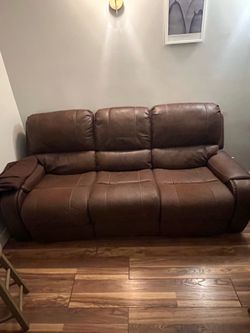 Brown leather sofa recliner