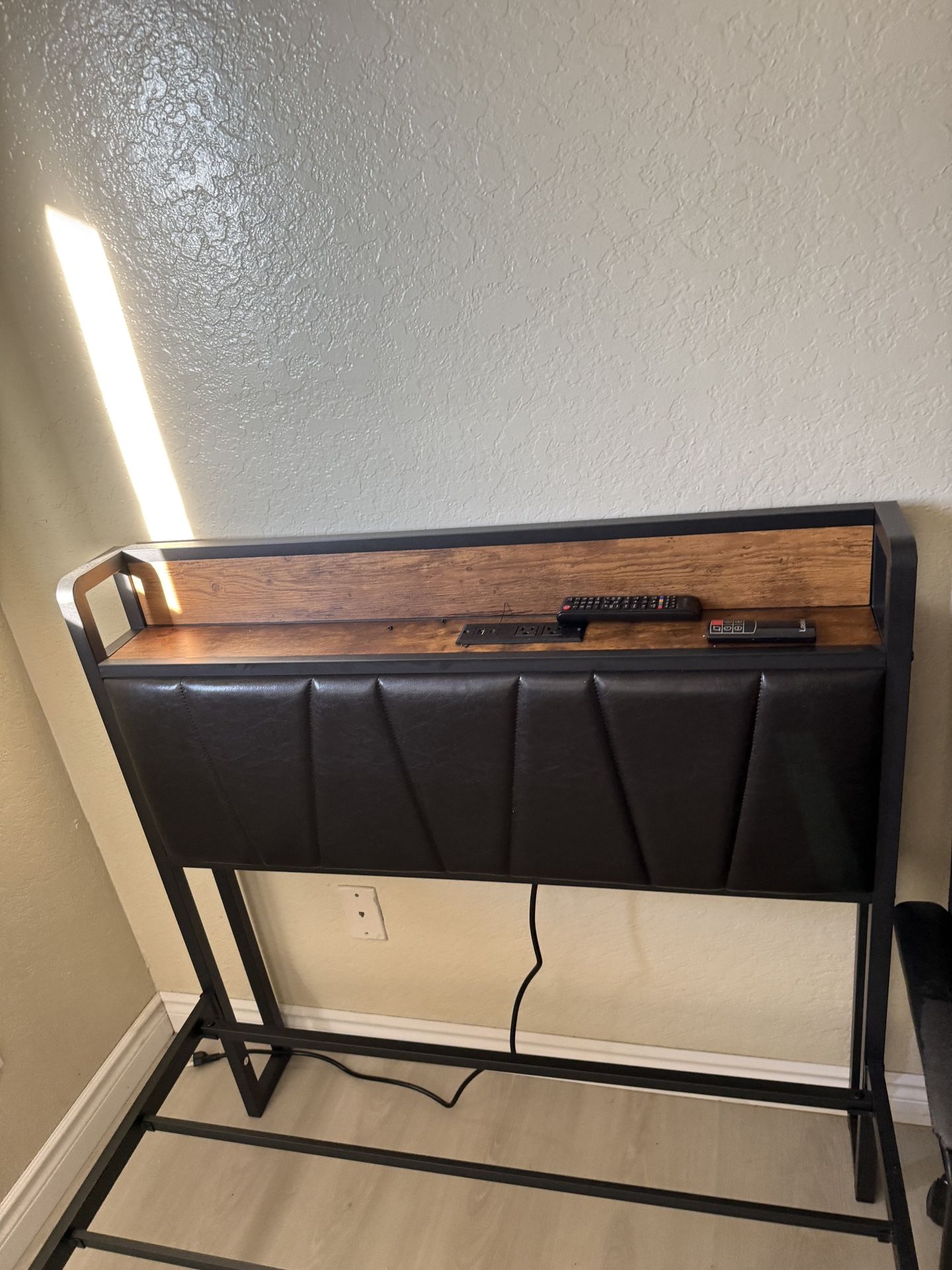 twin bed frame basically new Furniture