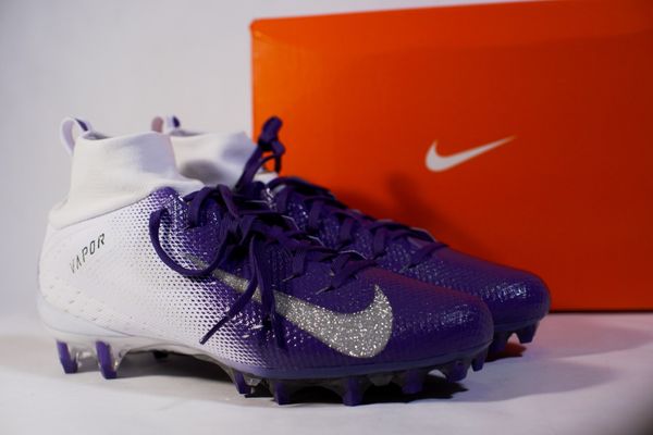 gold and purple football cleats