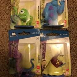 Pixar monster Inc. figurines.