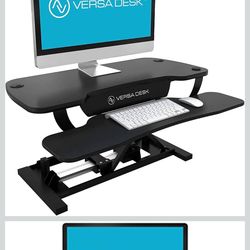 New in Box Electric desk riser Black retails new for $489