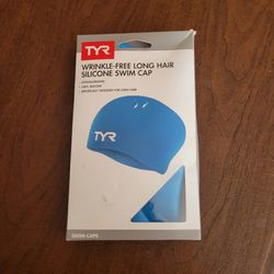 TYR Long Hair Wrinkle Free Silicone Swim Cap for Athletes Blue New, 
sealed. UPC 0(contact info removed)3762 4oz plus shipping materials.