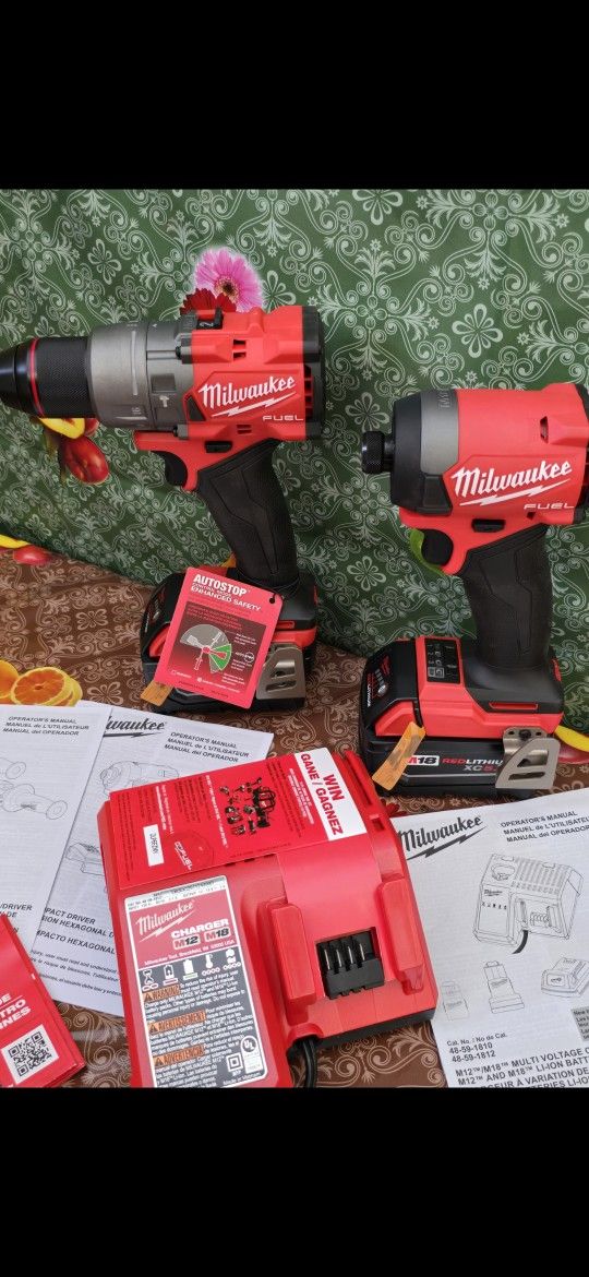 MILWAUKEE M18 FUEL 18-VOLT LITHIUM ION BRUSHLESS CORDLESS GEN-4 HAMMER DRILL AND IMPACT DRIVER WITH TWO HIGH CAPACITY 5.0AH BATTERIES AND CHARG