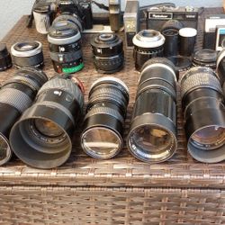 CAMERA   AND LOT OF LENSES  