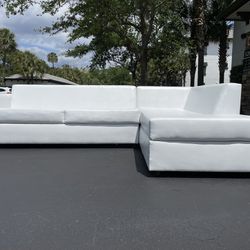Sectional sofa white faux leather / sofa bed / excellent condition / delivery negotiable 