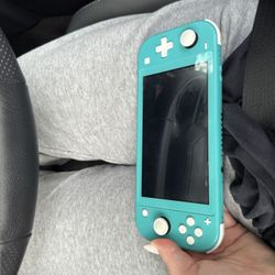 Nintendo Switch Lite With Animal Crossing Game card