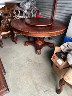 Round wood dining table with 4 chairs