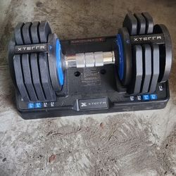 like new Xterra Adjustable Dumbbells Set
missing 1 weight.