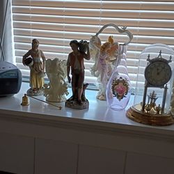 Mutible statues angles and single statue man and women