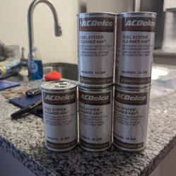 Fuel system cleaners