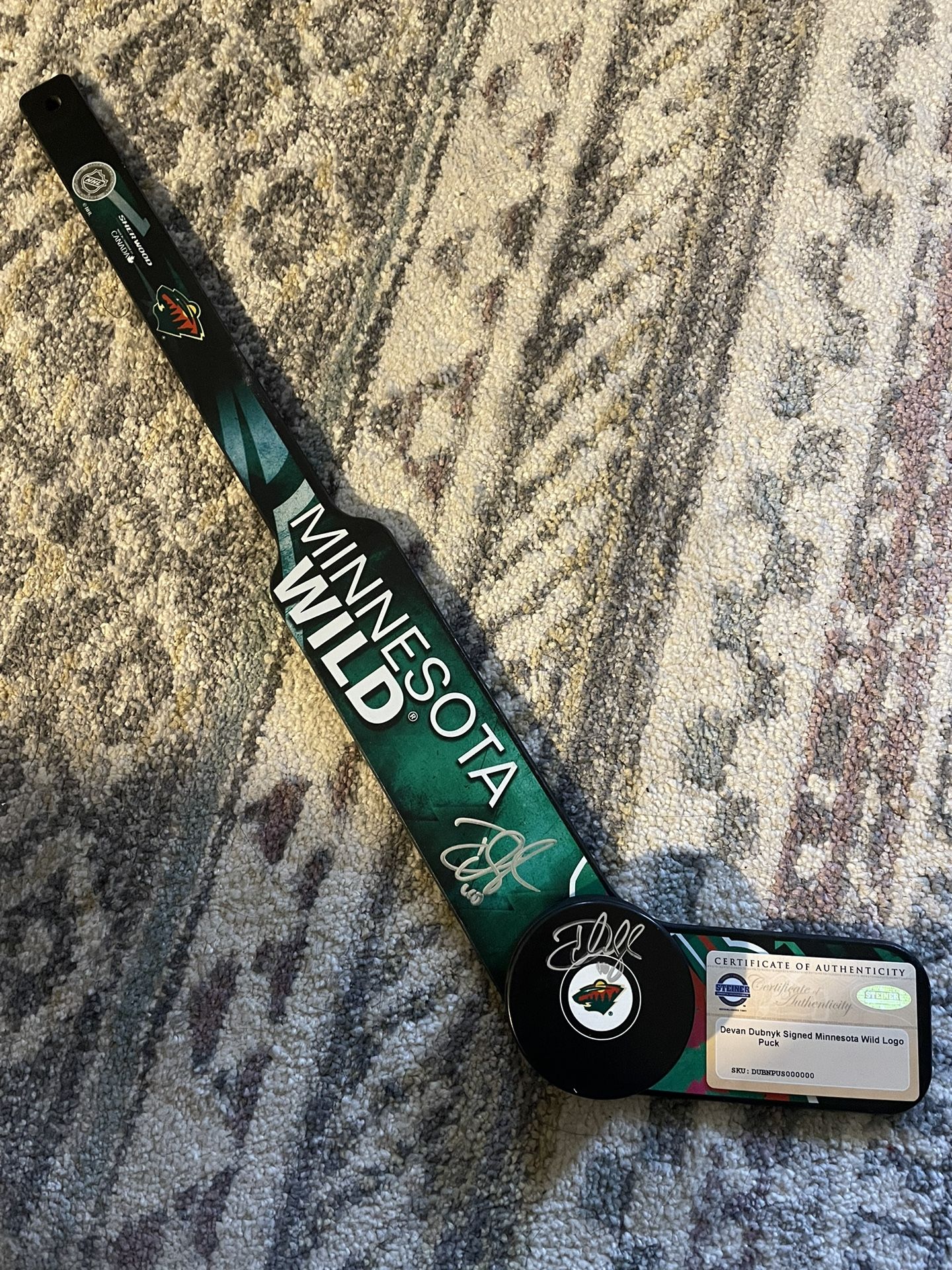 Devan Dubnyk Autographed Mini Goalie Stick and Hockey Puck with COA