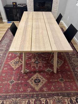 Dining room table + chairs + washable rug (optional)
