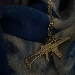 Reaps Gold Chains And Gun Pendant 