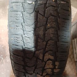 Tire.  A/T 275/85/18