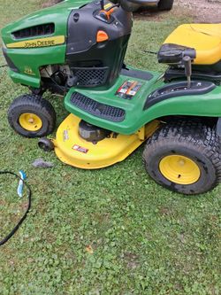 2006 125 Automatic 385.00 hrs everything works great ready to ride jonhdeer tires hold air