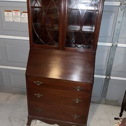 Mid-20th century mahogany Chippendale style secretary desk with hutch.