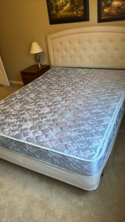 Queen bed, boxspring and frame.