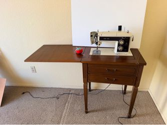 Vintage sewing machine and accessories