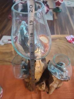 Blown glass on driftwood.