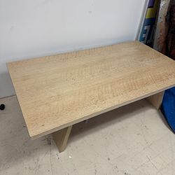 Real heavy wooden coffee table features a top crafted from maple wood - 58” x 32”