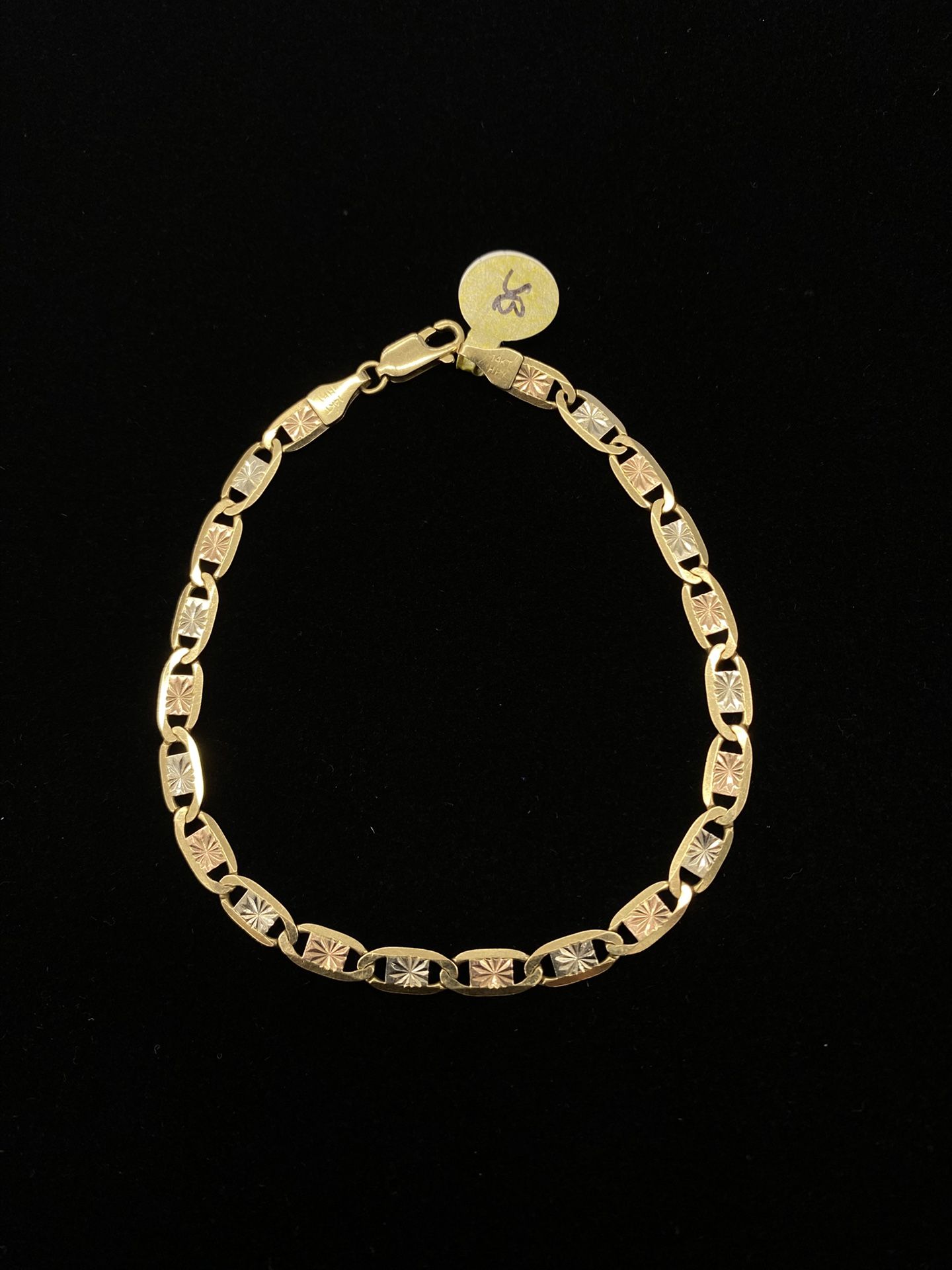 $900 Three Tone Gold Valentino Bracelet