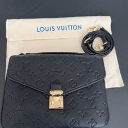 L V Cross body 