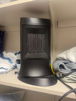 Space heater with turning base