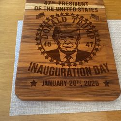 A cutting board of Trump’s inauguration January 20, 2025 It Measures 16 by 12 inches. It’s solid wood electronically engraved. That’s a real nice piec