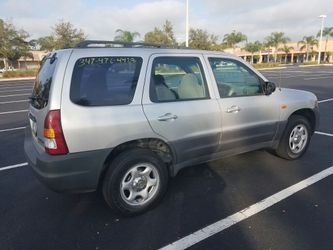2001 mazda tribute titulo limpio