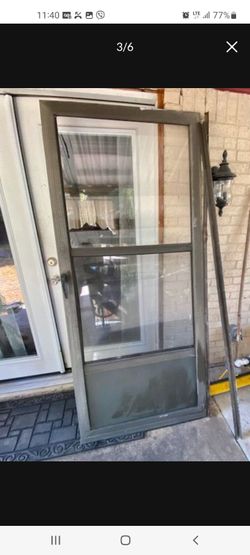 EXTERIOR DOOR METAL AND GLASS HAVE SCREEN GOOD CONDITION SIZE 36 ,×80