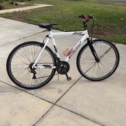 Genesis Saber Road Bike, 22” frame, 21-speed Shimano drive, 28” wheels brand new tires and tubes