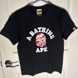 black and pink bape shirt 