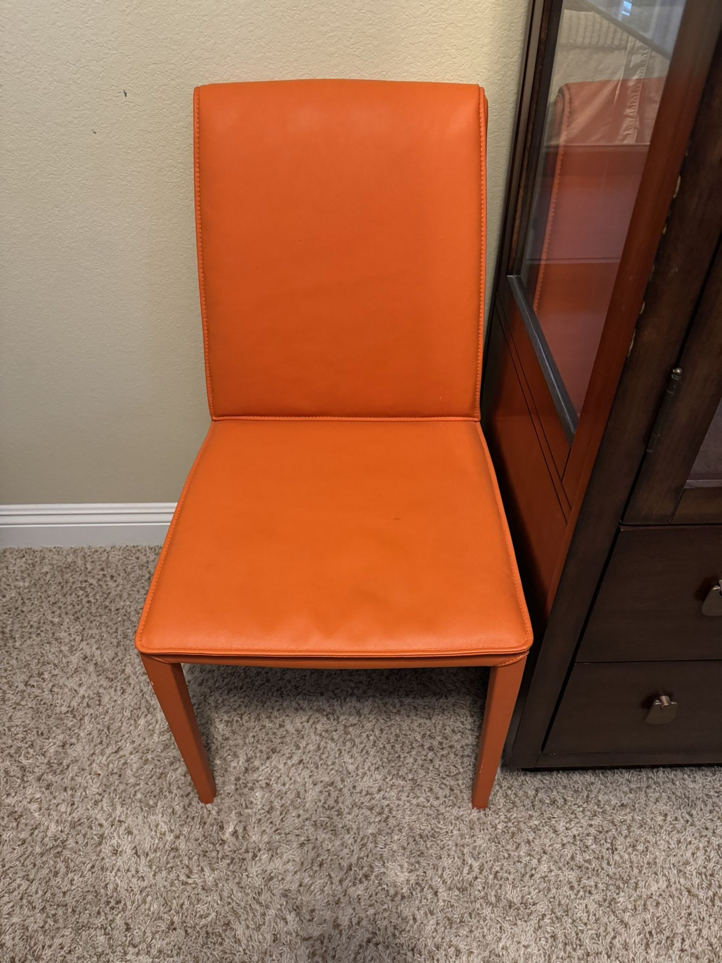 Orange accent piece or office desk chair OBO