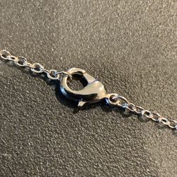 New 20 Inch Long Necklace W/ Multiple Rings To Make It Smaller, Has Lobster Claw Latch, No Markings, Thin Links.