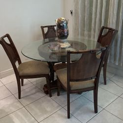 Kitchen table, 4 chairs, three barstools, leather, reclining sofa, two end tables, coffee table, and loveseat hutch