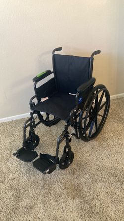 Wheelchair New With Footrests
