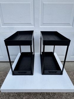 Two sets of black double-layer storage racks