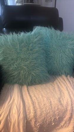 Two Teal Fuzzy Square Pillows