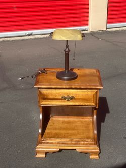 Antique nightstand with bankers lamp