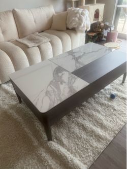Fireplace t v console -two bar stools and marble coffee table