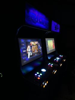 Full-size Arcade Cabinets with 12,000 Games!