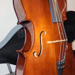 1/2 Cello Milan brand  + bow + sturdy proctectie case +rosin +endpin anchor, a humidifier 