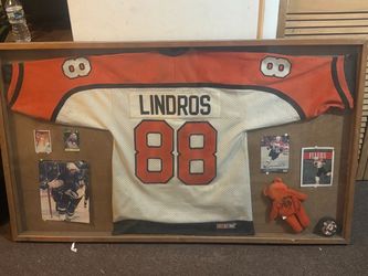 Eric lindros autographed jersey & Card/Display case