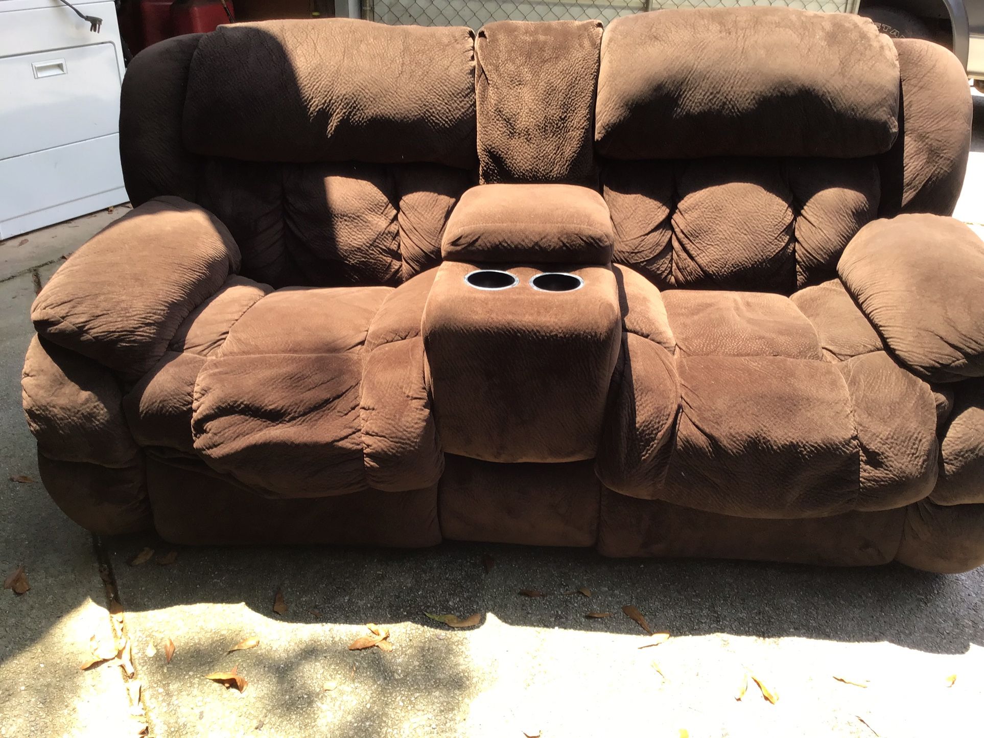 Loveseat With Cup Holders And Compartment And Reclines