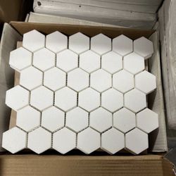 Thassos White Marble 2 inch Hexagon Mosaic Tile Polished   $10/sheet. We have 185 sheets.  Retails for $33/sheet 