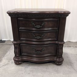 Traditional Dark Wood Three-Drawer Nightstand with Bail Pulls